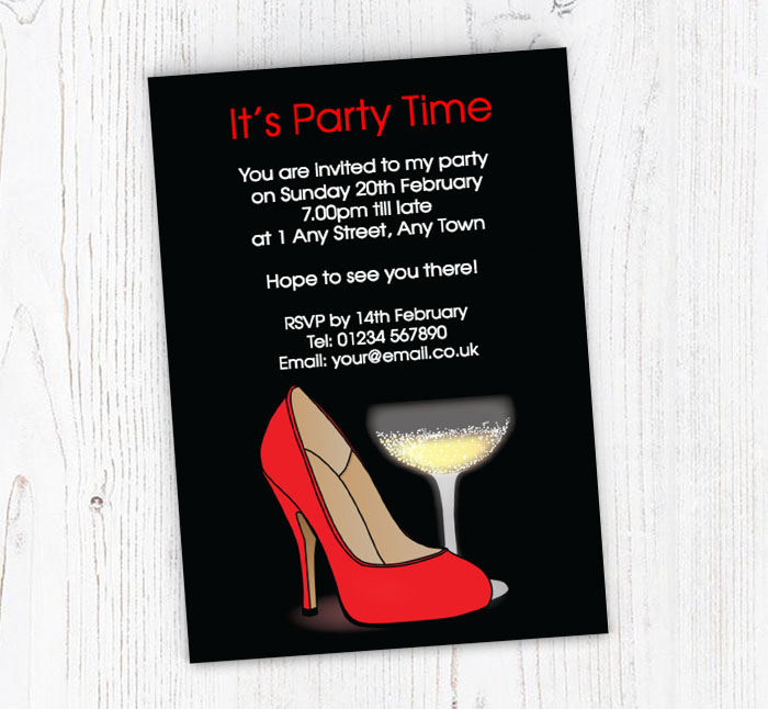 red shoe and champagne invitations