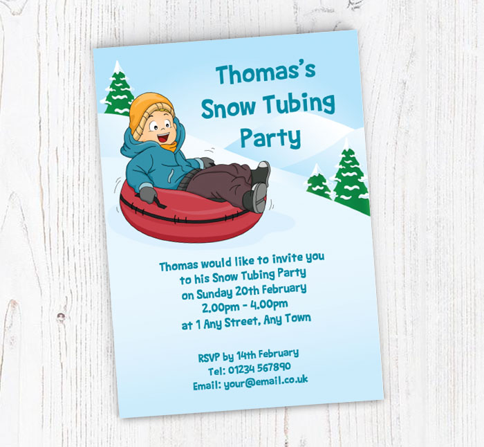 boy riding snow tube invitations