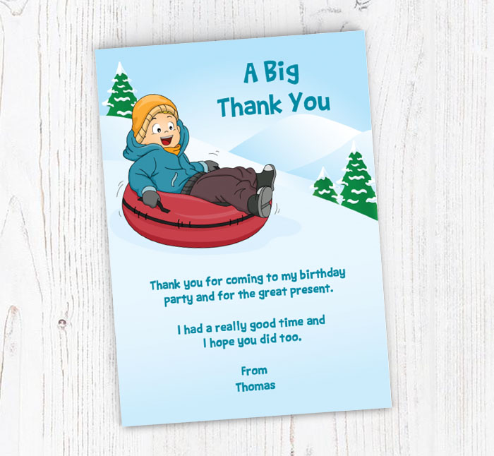 boy riding snow tube thank you cards