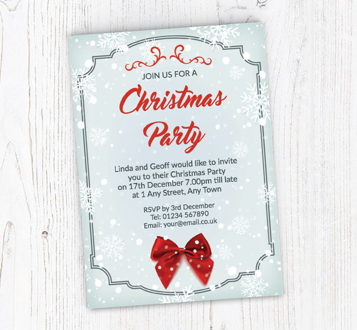 red ribbon and snowflakes invites