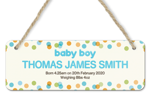 personalised dotty baby boy announcement hanging door sign