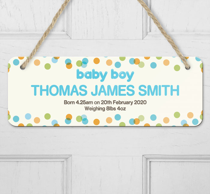 personalised dotty baby boy announcement hanging door sign